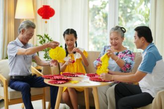 Family Making Tet Decorations