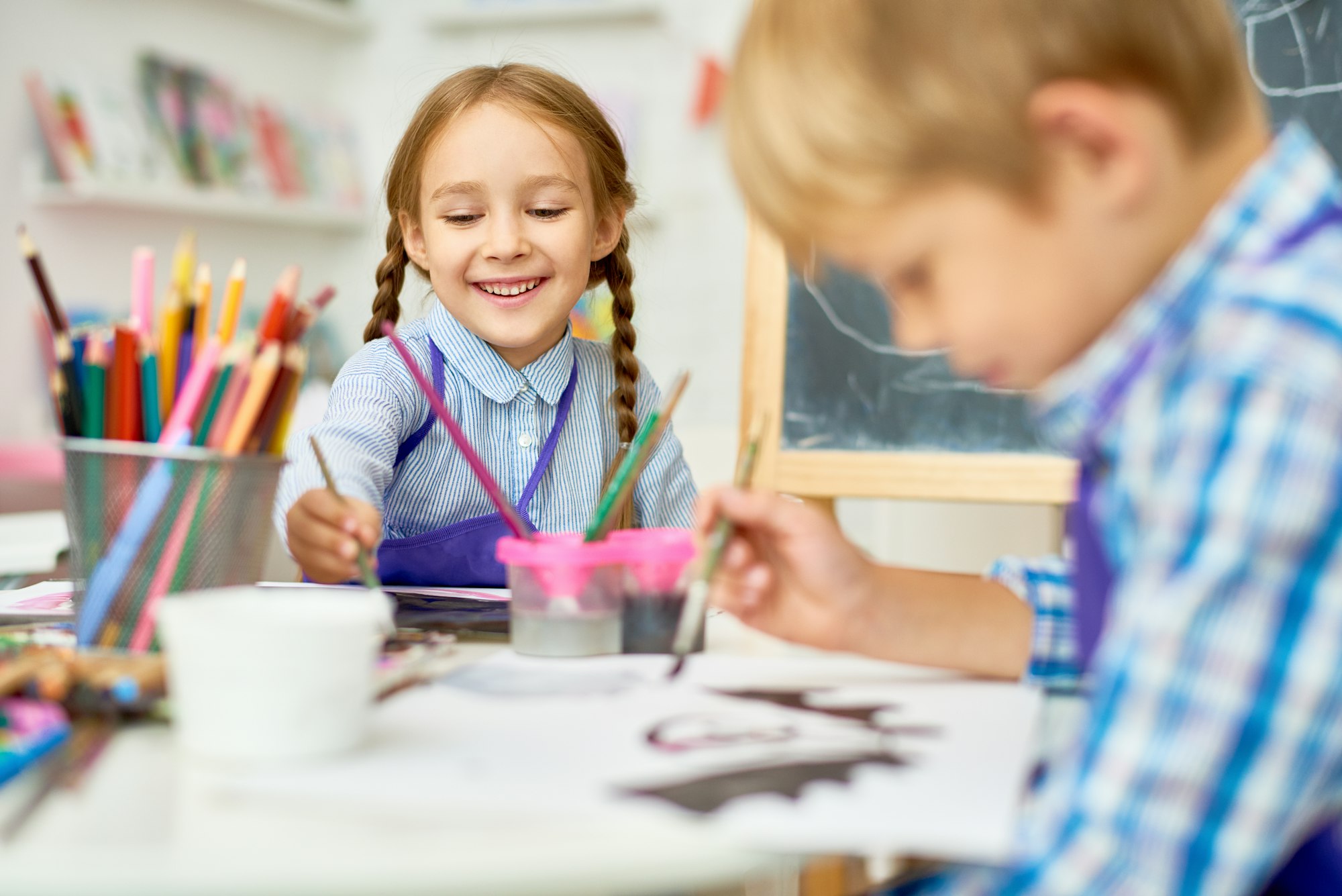 Happy Children Painting in Art Class